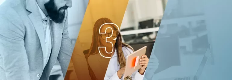 Tres personas trabajando en una oficina.